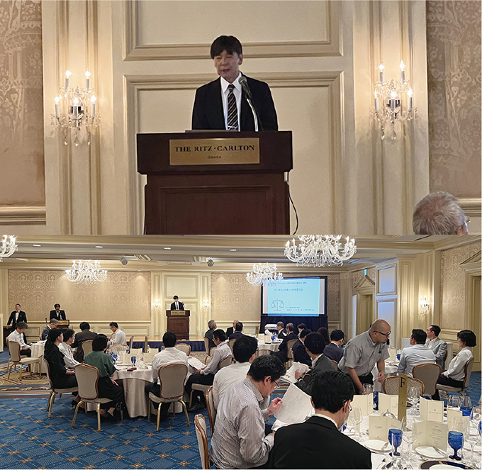 山口利昭会員と公演風景